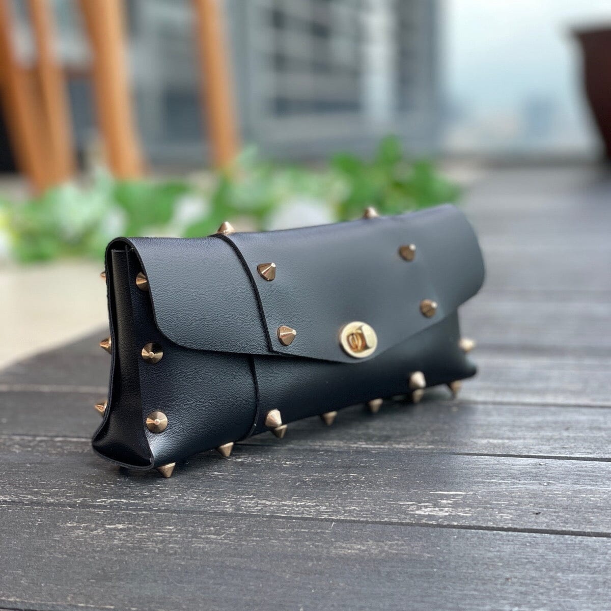 Star studded maxi clutch LOVEFREYA Black Gold Bags